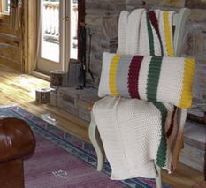 Jeté et coussin Tom de Brunelli.